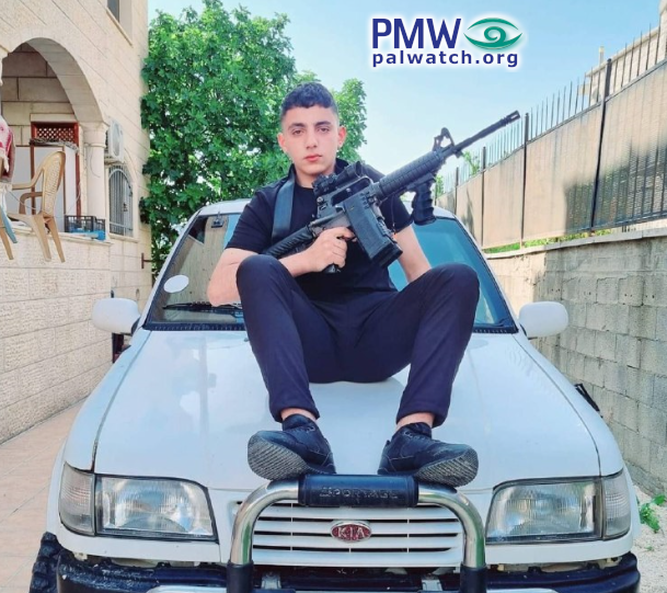 Picture of 16-year-old terrorist with rifle